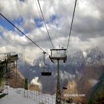 travel-auli-open-cable-chair-on-cloudy-day