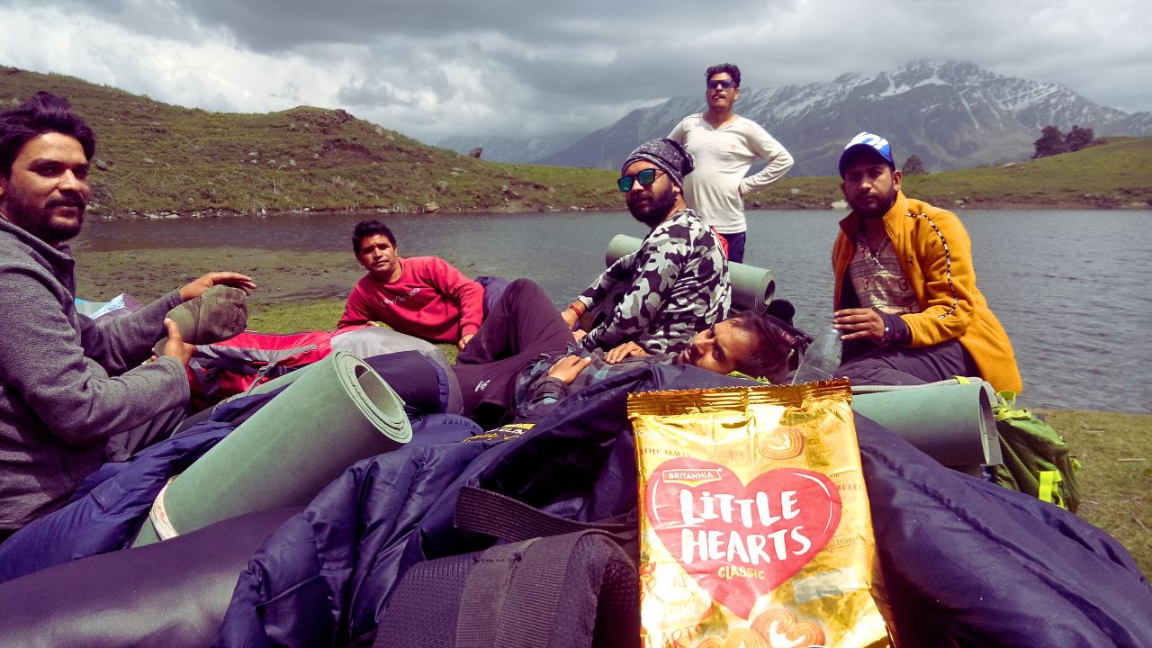 the group at tali lake before setting up camp while on trek to kuari pass