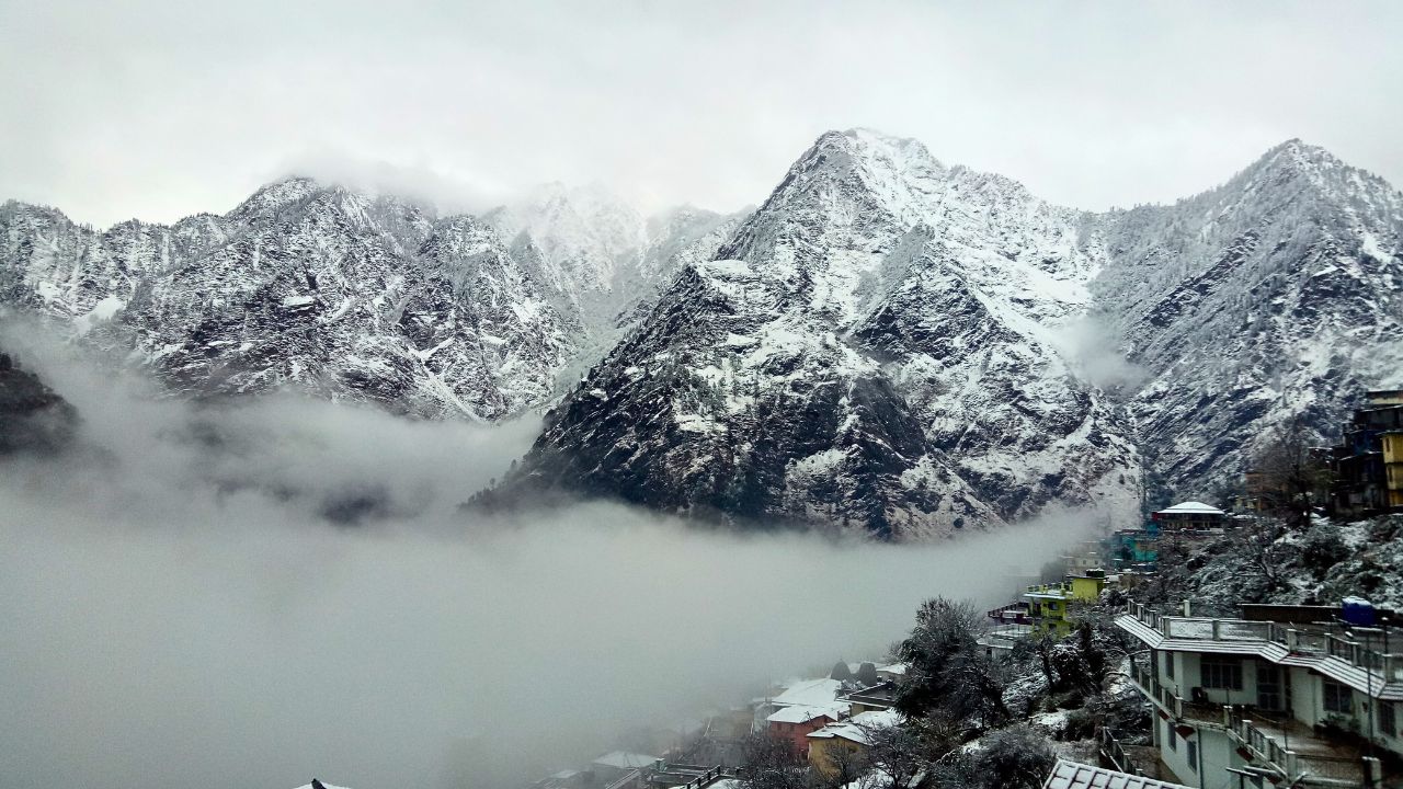 first snowfall while on winter vacation in the mountains