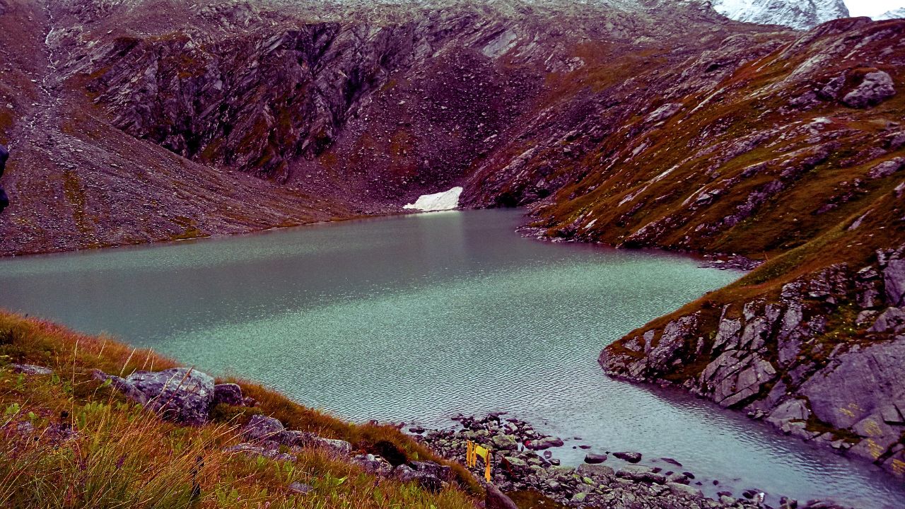 The calm and pristine water of the mystical Kagbhusandi Lake