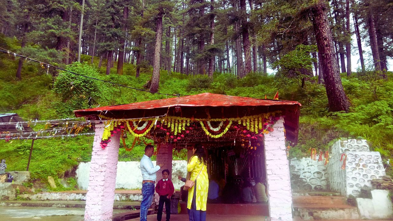 The sacred temple of Bhavishya Badri with towering Deodar trees in the backdrop